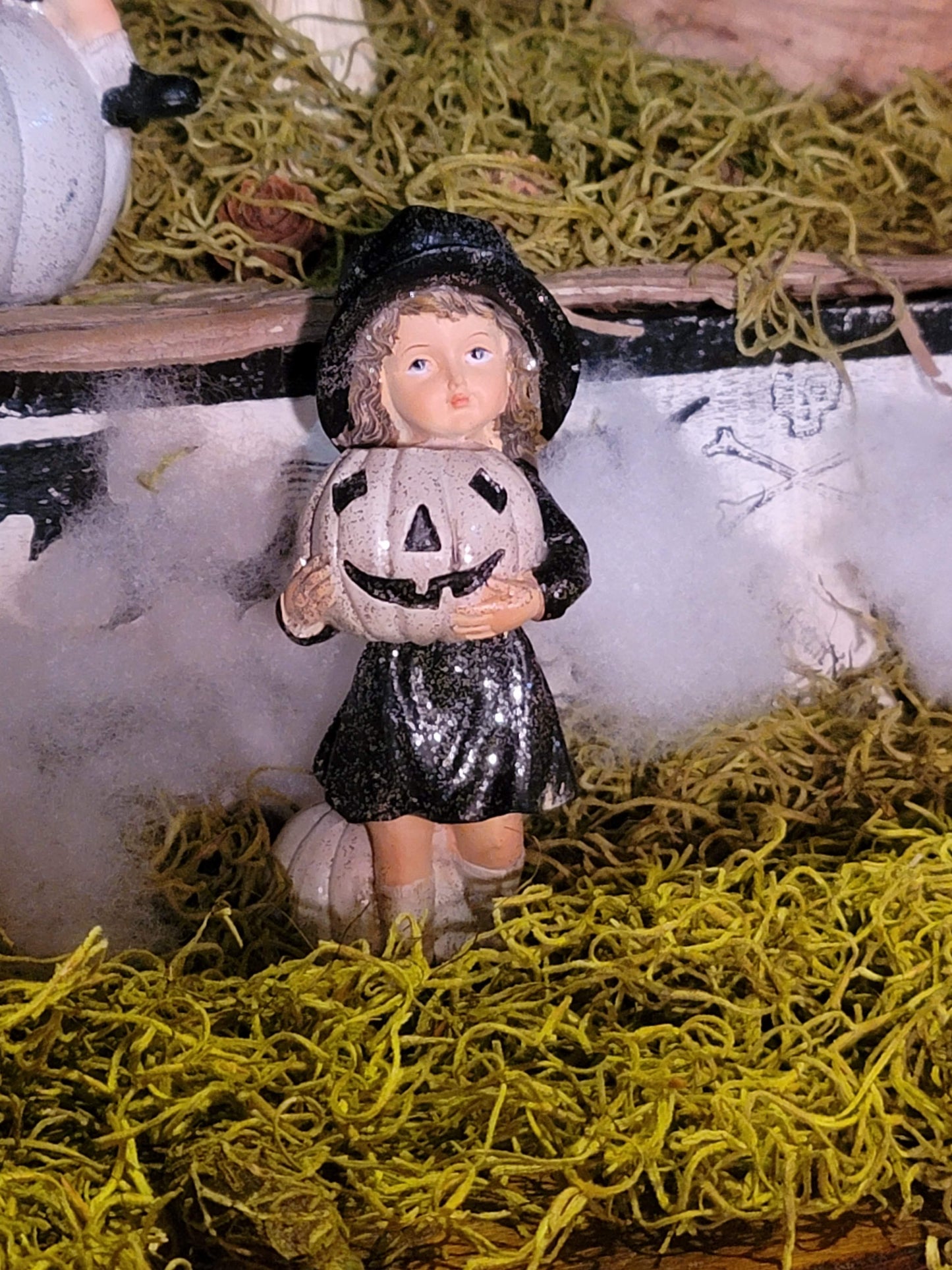 Vintage Halloween Style Glittered Girl in Hat with Pumpkin