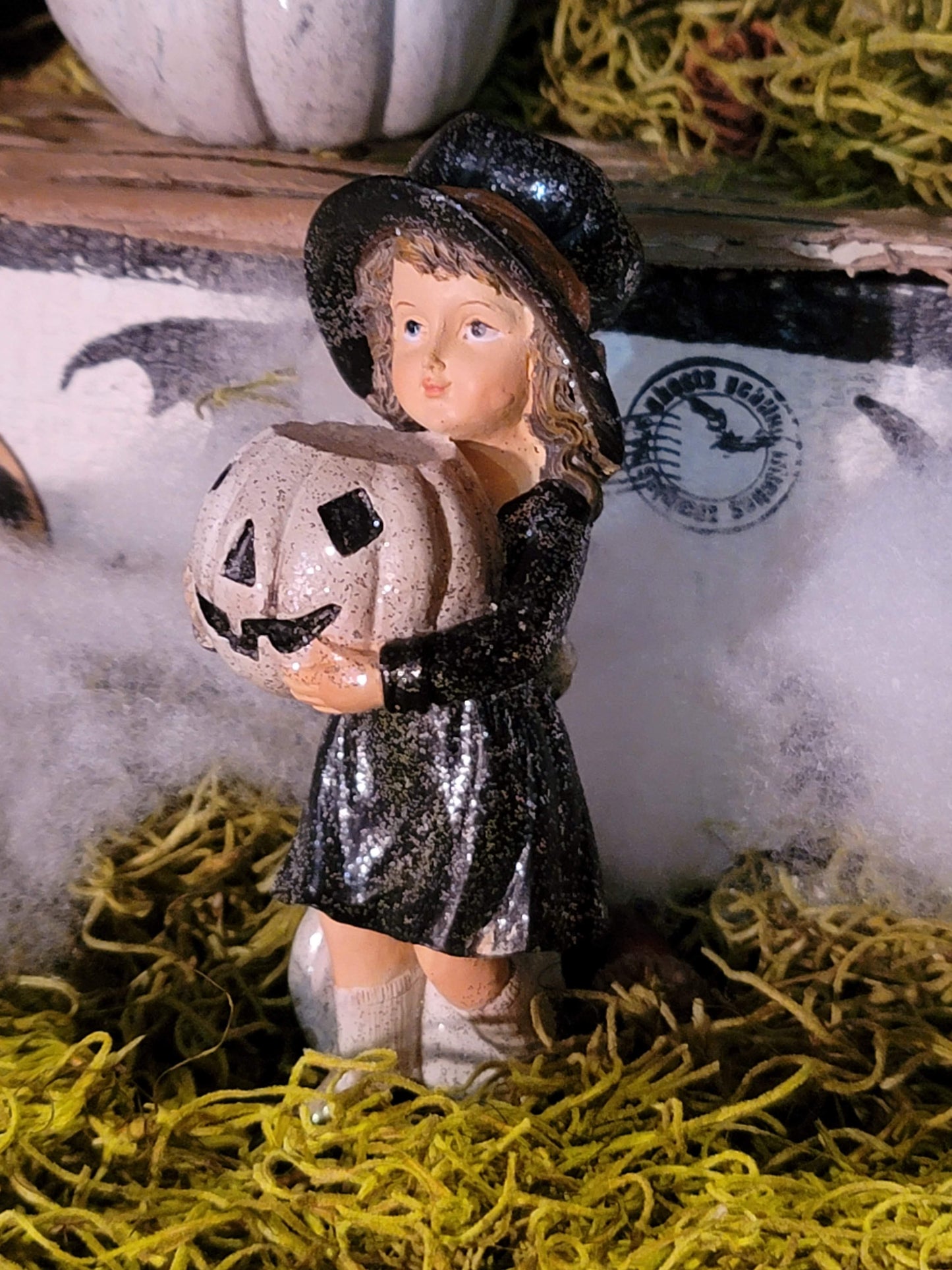 Vintage Halloween Style Glittered Girl in Hat with Pumpkin